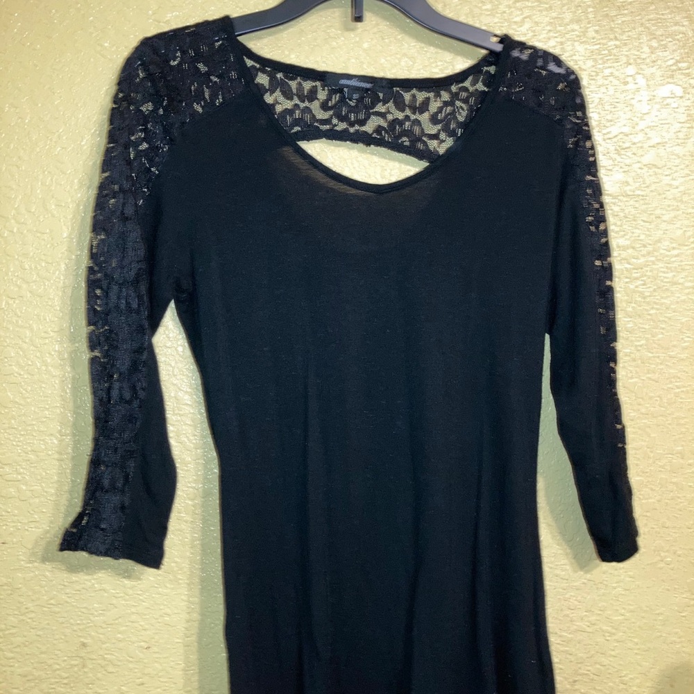 A black laced semi-long sleeve shirt